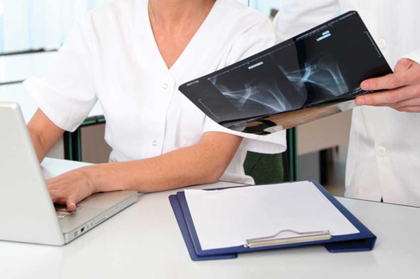 Doctors Reviewing X-Ray