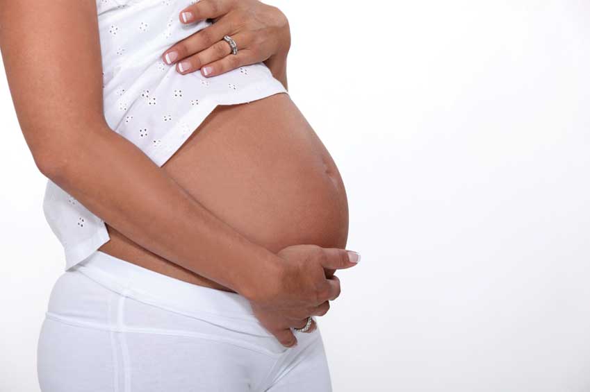 Pregnant Woman Holding Belly