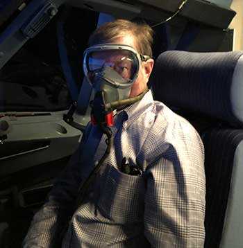 picture of terry bryant in a plane as a pilot