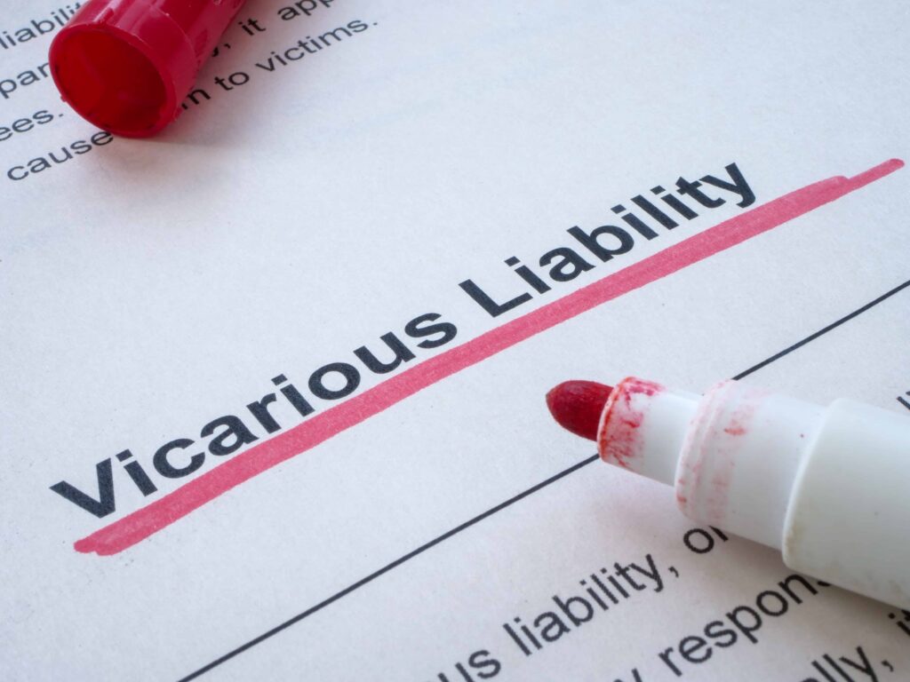 Close-up of “Vicarious Liability” highlighted on a legal document with red marker, illustrating employer responsibility and legal accountability concept Close-up of “Vicarious Liability” highlighted on a legal document with red marker, illustrating employer responsibility and legal accountability concept
