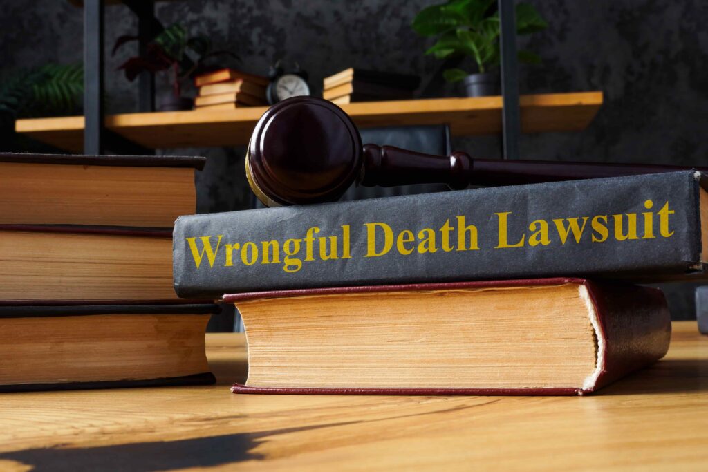Law books with a judge’s gavel and a volume titled “Wrongful Death Lawsuit,” symbolizing legal claims, wrongful death litigation, and civil justice proceedings. Law books with a judge’s gavel and a volume titled “Wrongful Death Lawsuit,” symbolizing legal claims, wrongful death litigation, and civil justice proceedings.