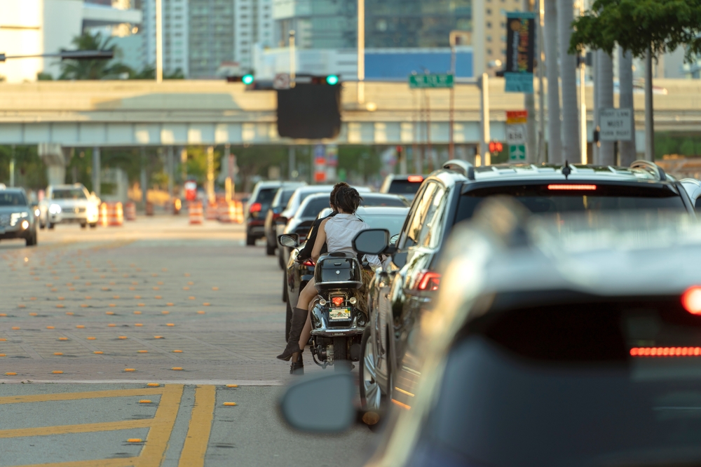 Motorcycle rider waiting in traffic