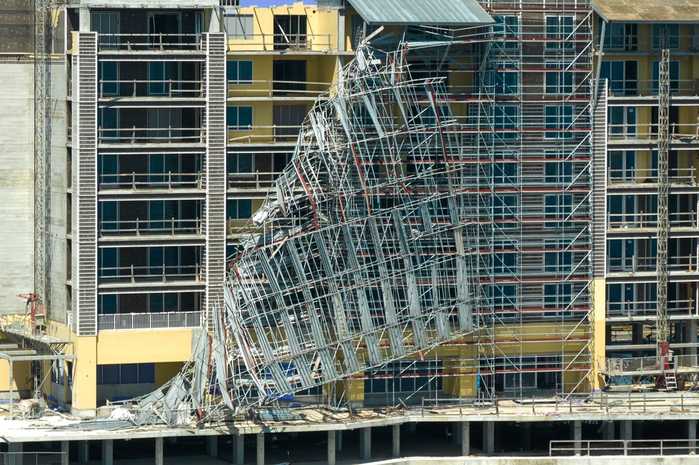 View of scaffolding collapse on construction site.