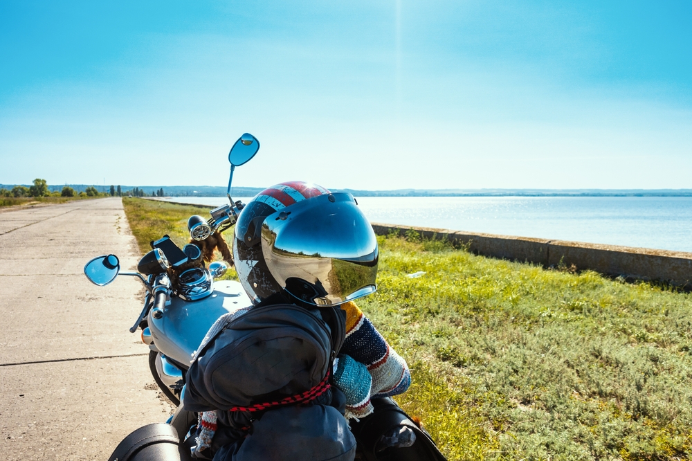 Parked motorcycle with helmet on seat
